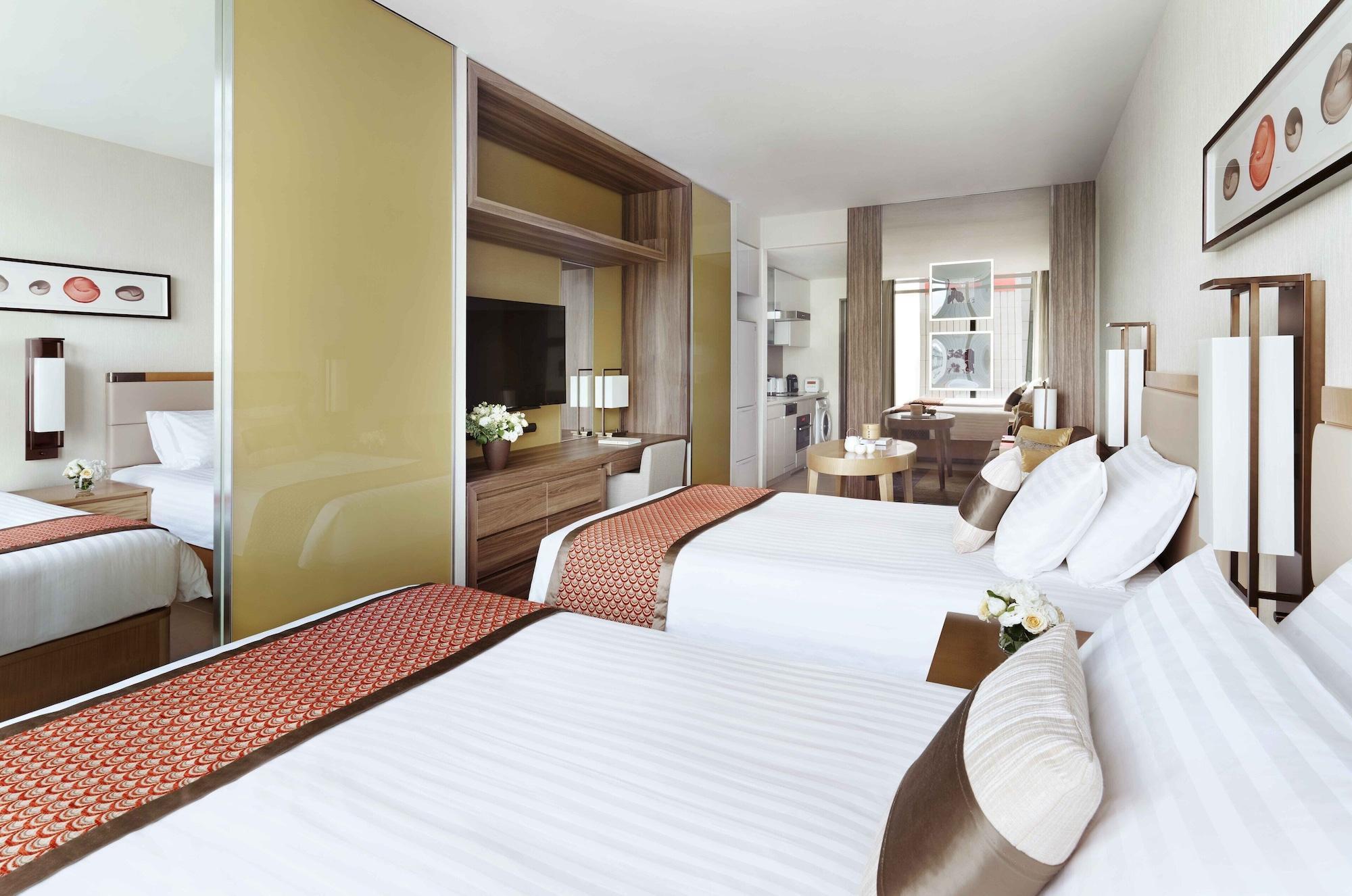 Oakwood Premier Tokyo Hotel Luaran gambar A typical room at the hotel