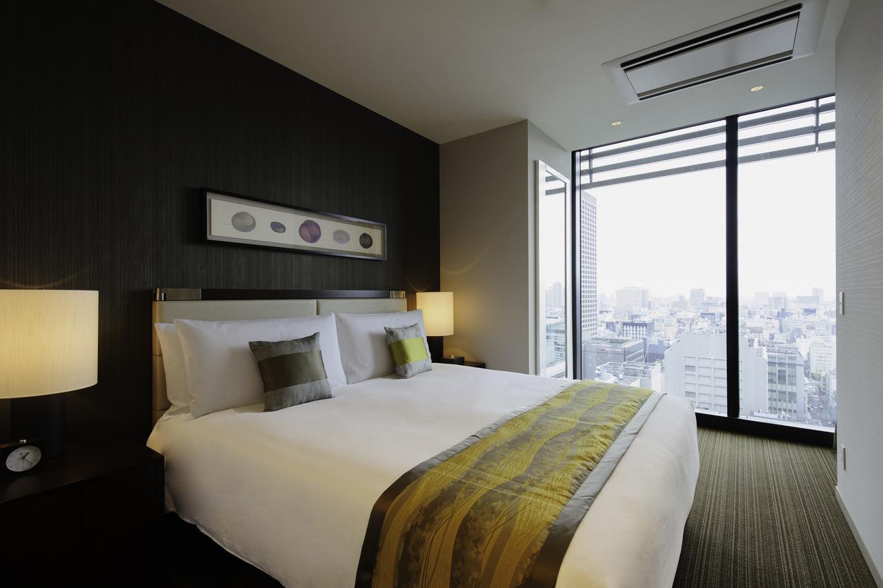 Oakwood Premier Tokyo Hotel Luaran gambar A bedroom at the hotel
