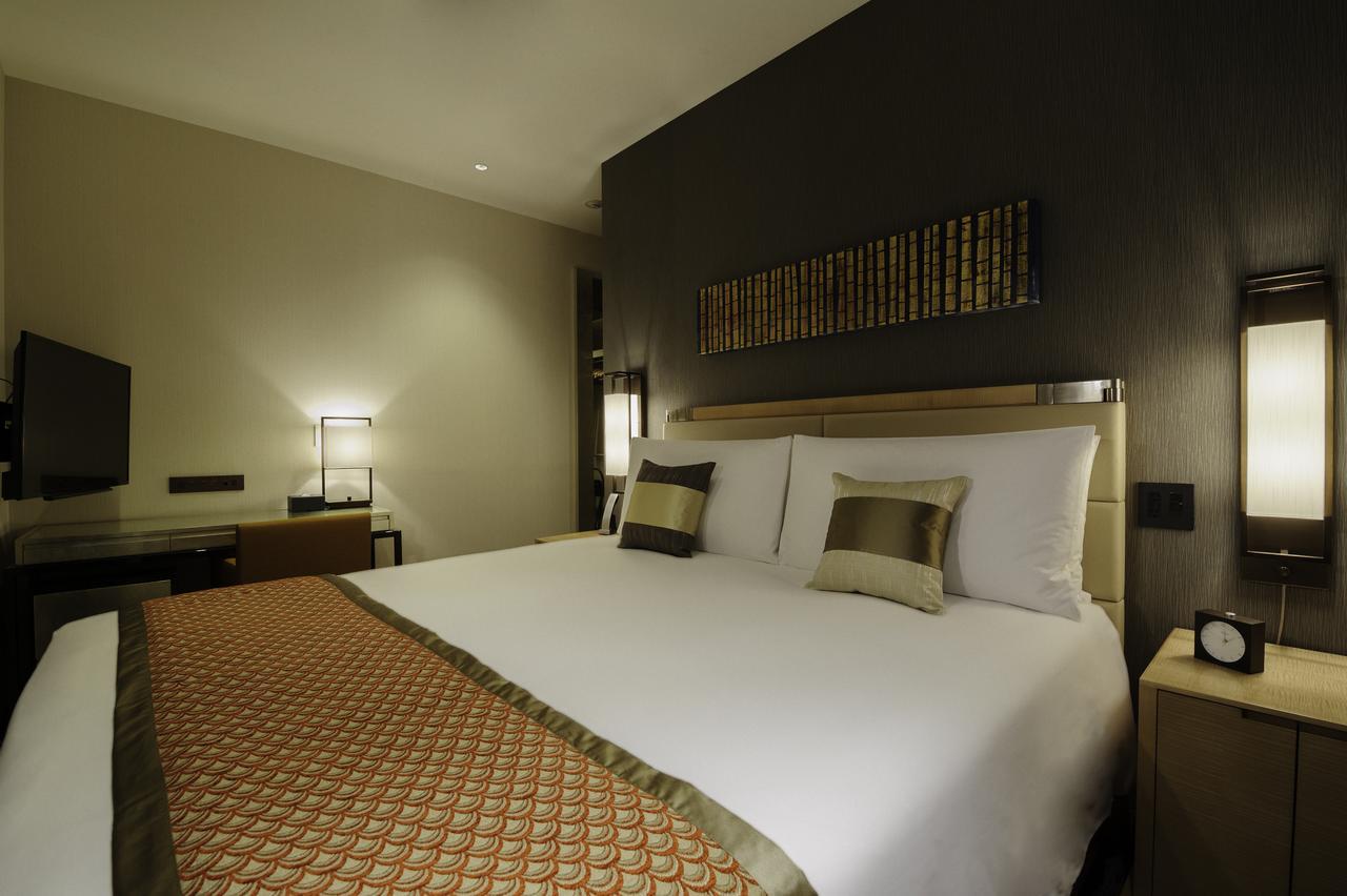 Oakwood Premier Tokyo Hotel Luaran gambar A bedroom at the hotel
