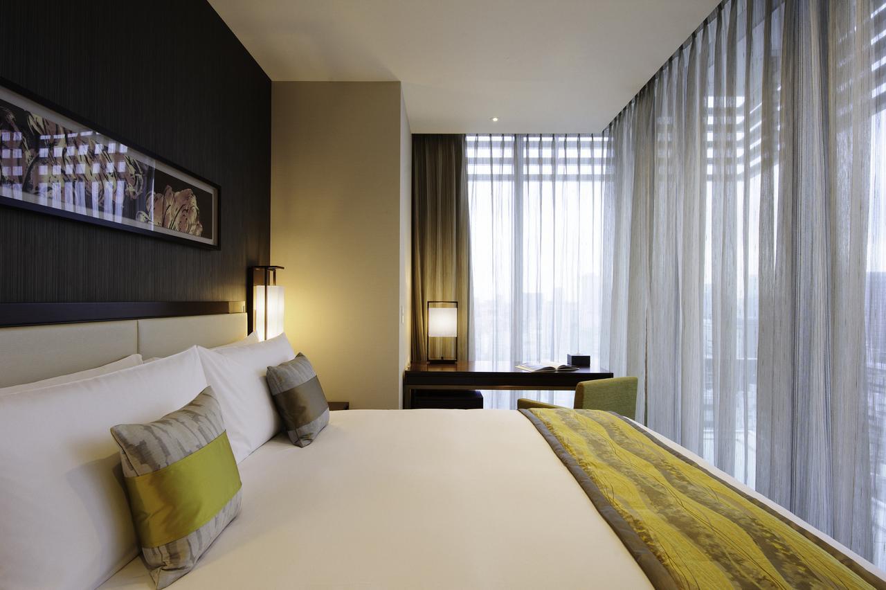 Oakwood Premier Tokyo Hotel Luaran gambar A bedroom at the hotel